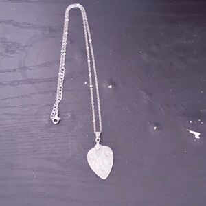 Jade quartz heart-shaped pendant necklace.